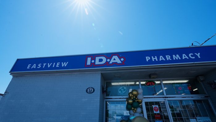 Eastview I.D.A. Pharmacy storefront signage in the sun